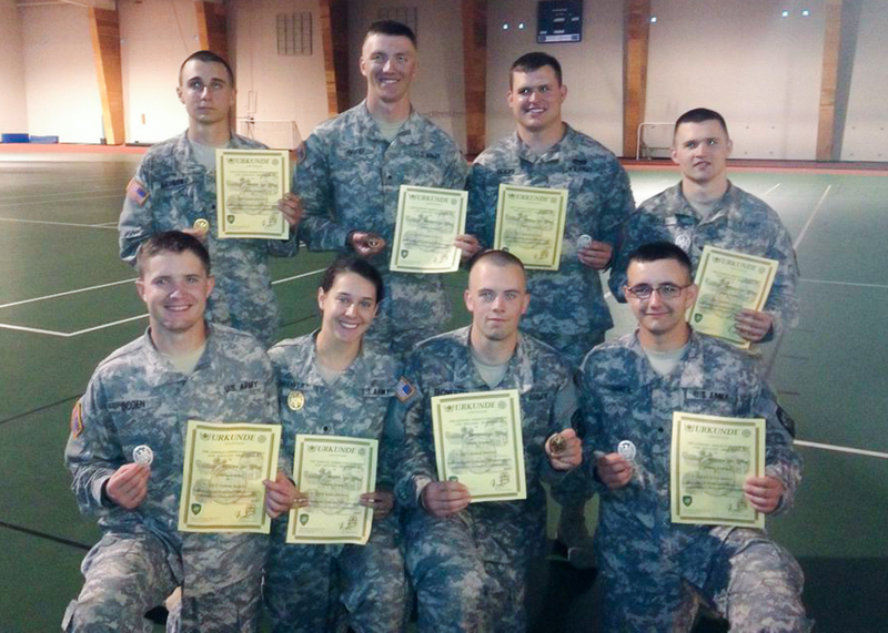 Chadron State College Army ROTC members pose with the German Armed Forces Proficiency badges they earned in late May in Minnesota.