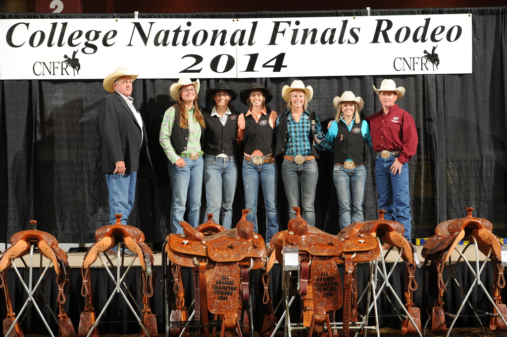 Members of the Chadron State College women’s rodeo team with officials at the College National Finals Rodeo.