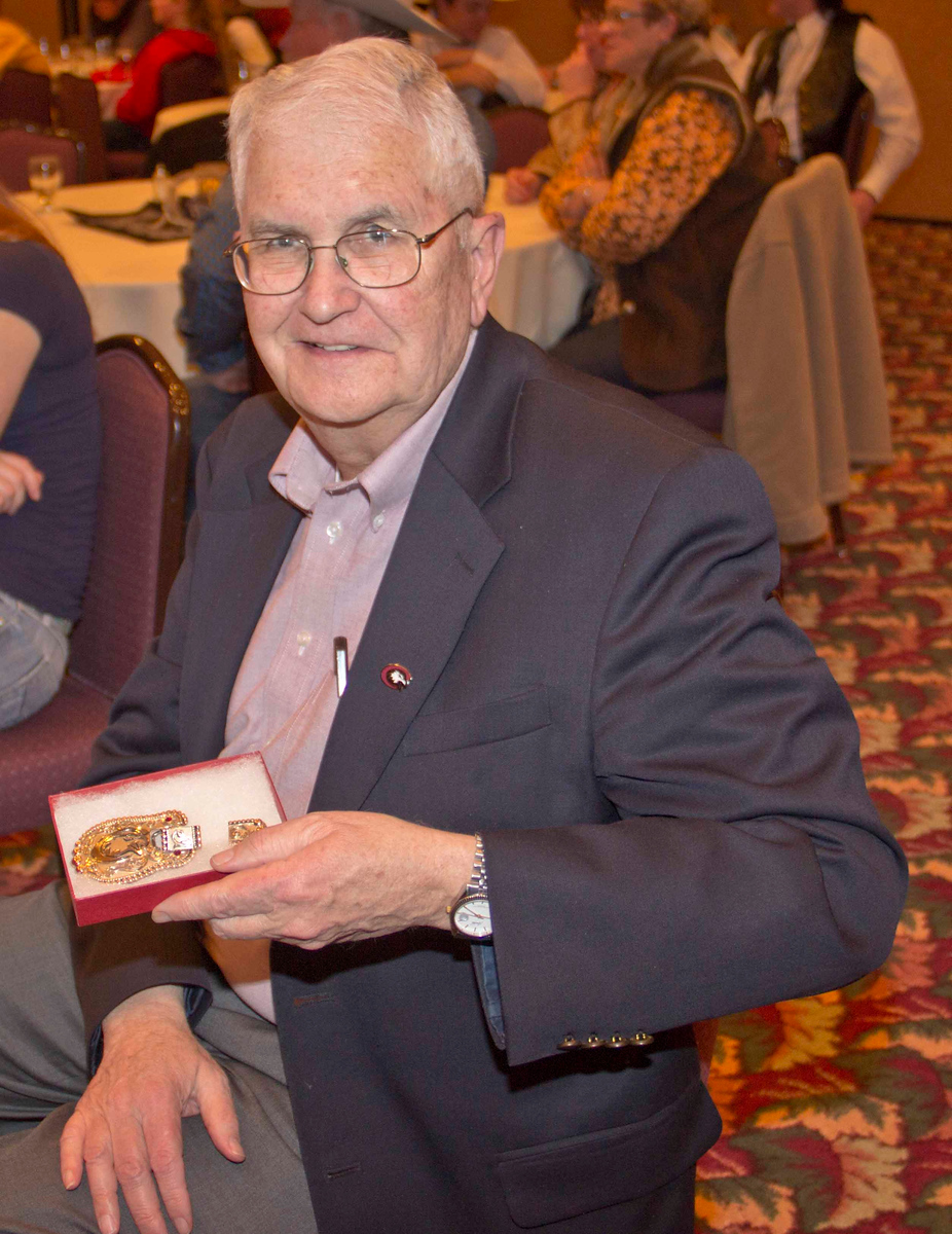 Con Marshall and his wife Peggy were honored for their years of support of the CSC rodeo program at the Black Tie Calf Fry. Con also received a CSC belt buckle in appreciation for his news coverage of the team