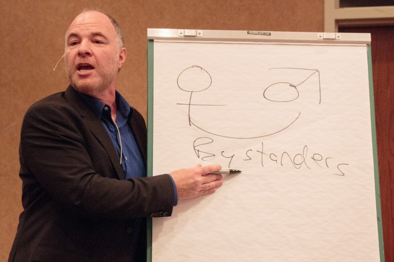 Dr. Jackson Katz addresses a maximum capacity crowd in the Chadron State College Student Center Tuesday.