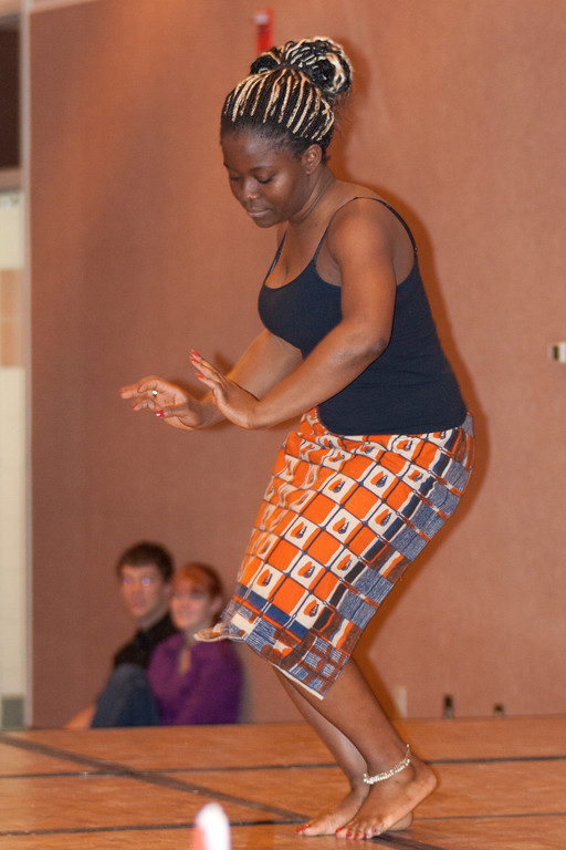 Chadron State College graduate Gbedegbegon Mercy Gagnon of Togo dances during the International Club's 2012 Food Tasting Party.