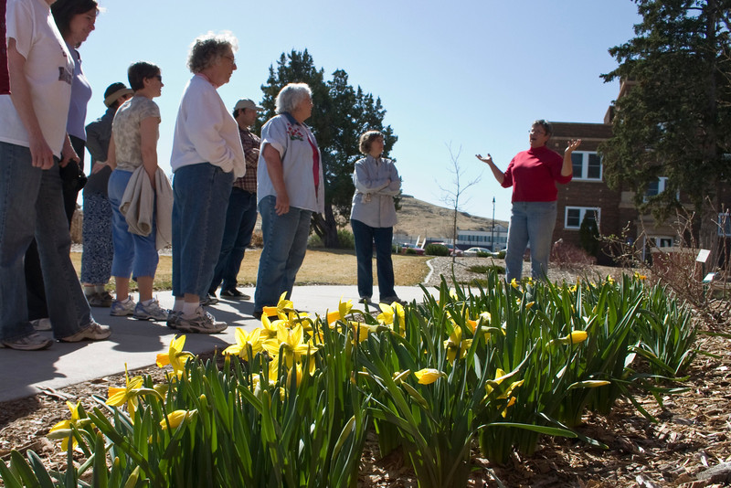 Lucinda Mays, right, leads a tour for Campus Arboretum Volunteers in 2013.