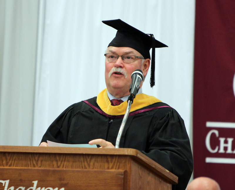 John Jacox delivers his message to the graduating class during undergraduate commencement Saturday.