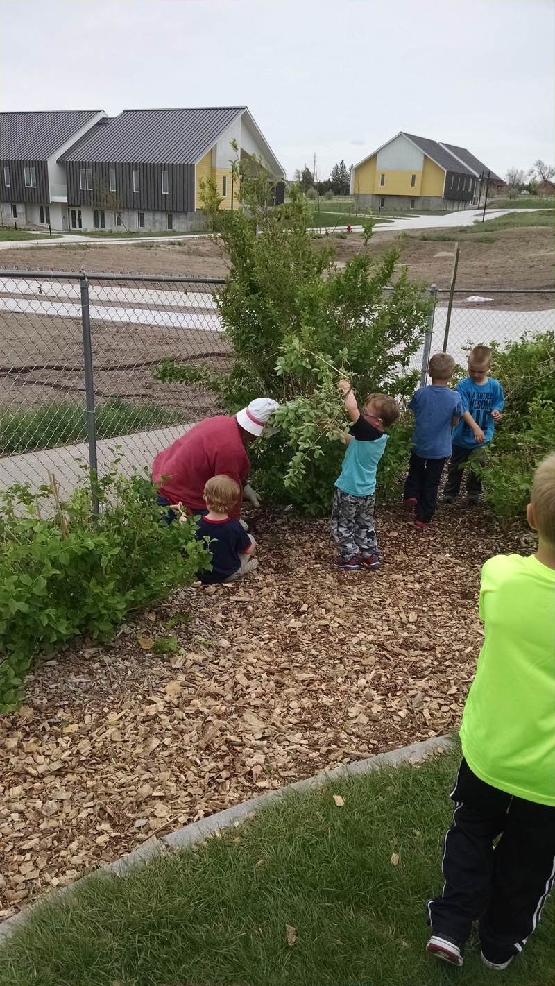 CSC employees are assisted by children attending the Child Development Center.