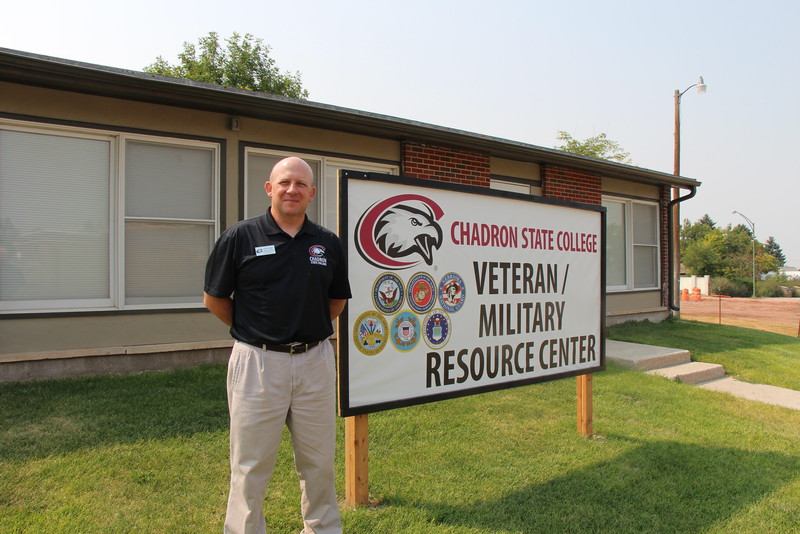 Chris Singpiel stands in front of the new West Court unit 26.