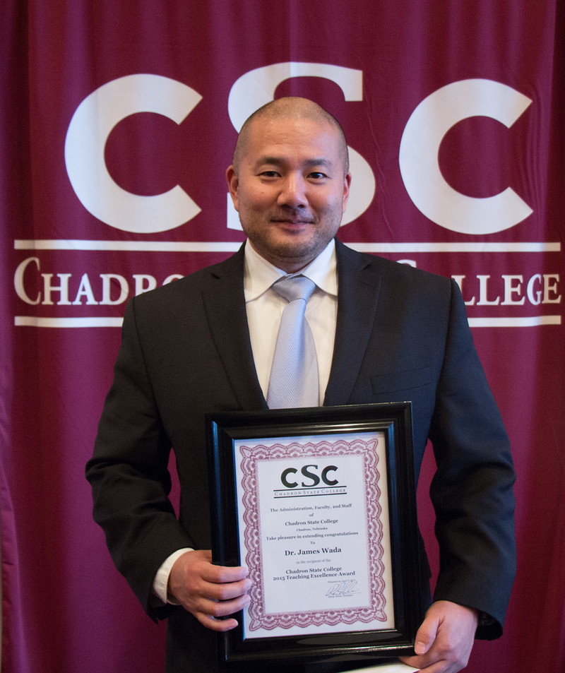 Jamie Wada in April 2015 with his CSC Teaching Excellence Award