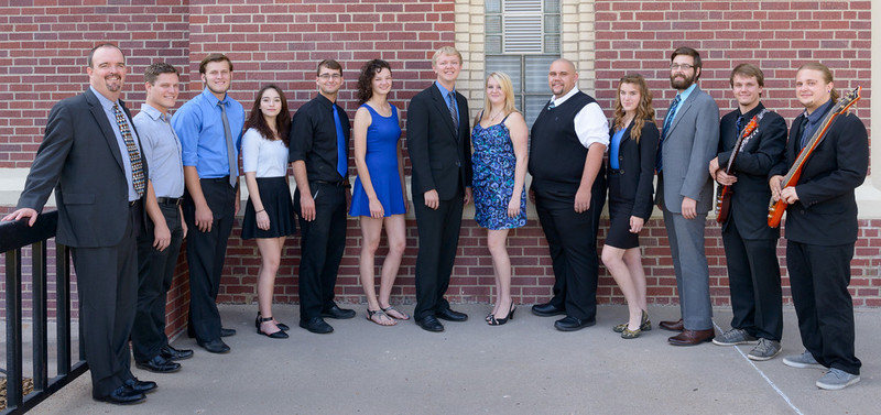 Chadron State College music faculty member Dr.Joel Schreuder and accompanist Bobby Pace with CSC students
