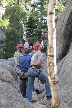Students prepare to rock climb