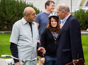 Dr. Marv Neuharth explains the concept of the reverse steering bike to Dr. Randy Rhine