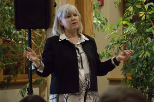 Karen Gettert Shoemaker speaks in the Sandoz Center