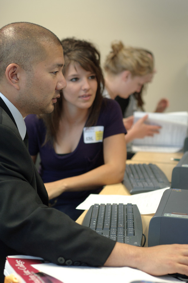 Dr. Jamie Wada, Chadron State College assistant professor of justice studies, works with an incoming justice studies student at a registration event in 2011.