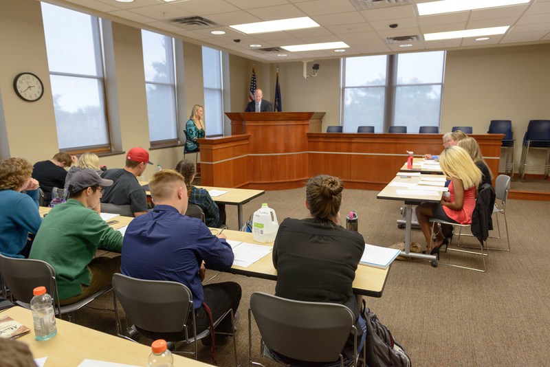 Dr. Michael Bogner conducts a course in Old Admin's mock trial room.