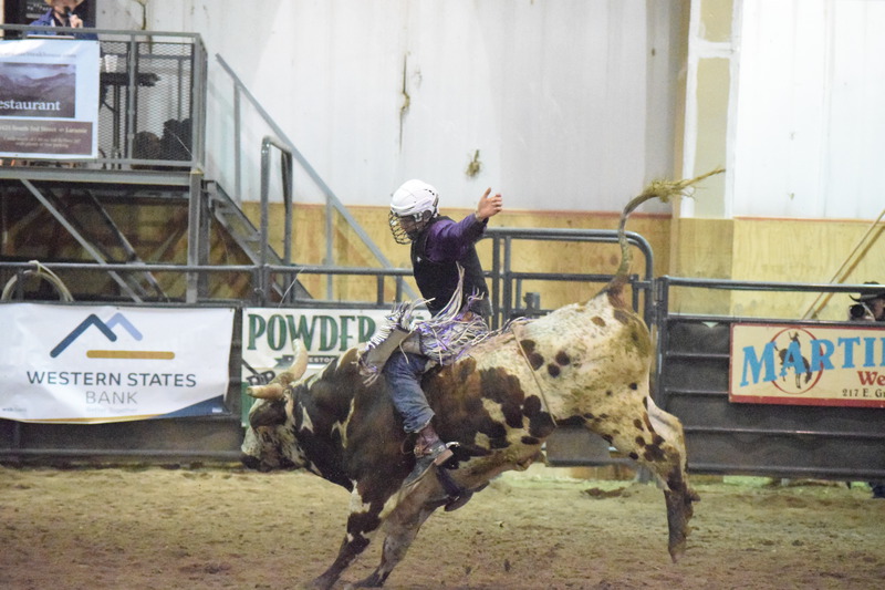 Chadron State College rodeo team member Chasen Cole rides one of his bulls at the University of Wyoming rodeo in late April 2017