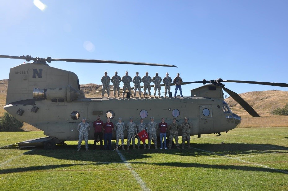 Chadron State College Army ROTC cadets pose on a Chinook helicopter during homecoming festivities Oct. 8, 2016.