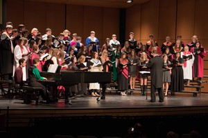 Dr. Joel Schreuder leads the choir