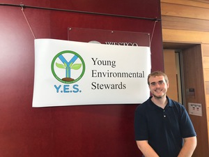 Quentin Wagner poses with Y.E.S. flag