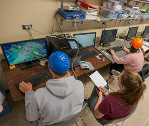 Gabrielle Brumfield works with students