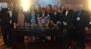 Phi Beta Lambda students pose with their awards