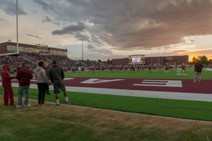 CSC football players warm up before game