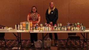 Students pose with food donations