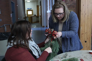 Students create an evergreen swag