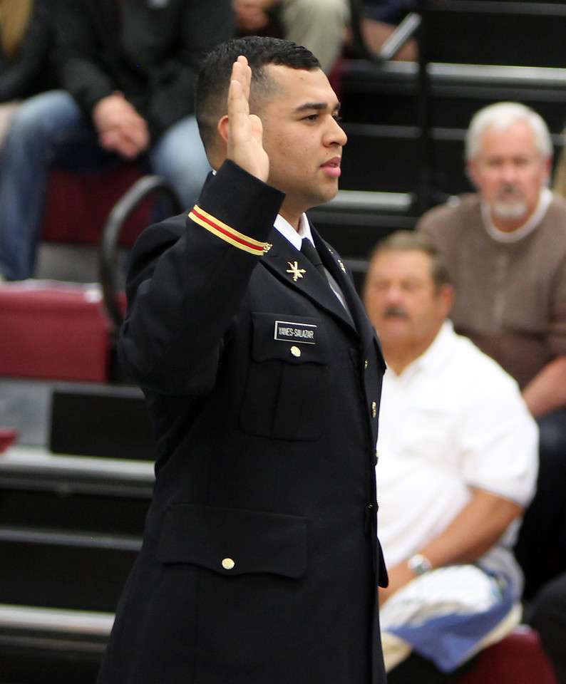 Chadron State graduate Cristian Yanes-Salazar receives his Army Second Lt. commission Saturday, May 8, 2015.