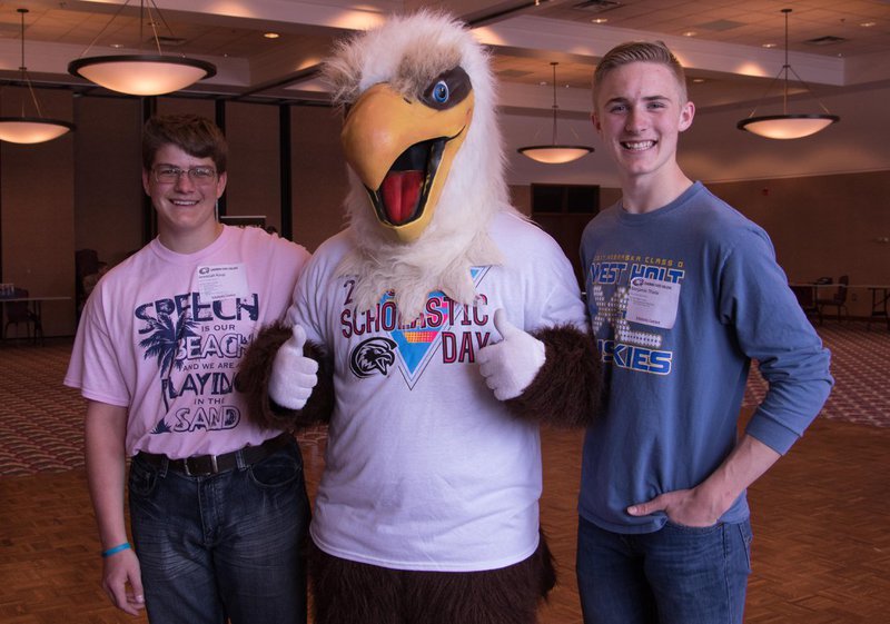 Benjamin Thiele, left, and Jeremiah Kaup, both of West Holt High School, pose with Elmo during Chadron State College's annual Scholastic Day Contest in the Student Center Ballroom April 6, 2018.