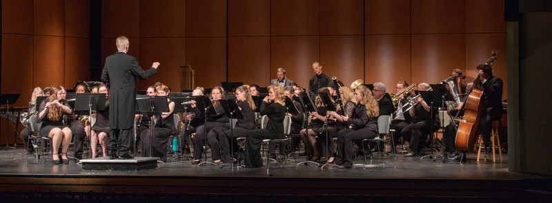 Associate Professor Dr. John Wojcik, center, leads the Chadron State College Wind Symphony and Community Symphonic Band concert April 9, 2019, in Memorial Hall.