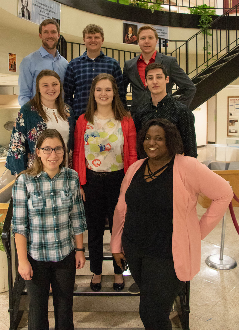 Chadron State College students shared their presentations for the Nebraska Academy of Science meeting April 29, 2019, with CSC students and faculty in the Math and Science building. Front row, from left, Maria Peterson of Moundridge, Kan., Pricess Uba of Abuja, Nigeria. Second row, from left, Makala Michka of Stuart, Neb., Gabrielle Brumfield of Pendleton, Ind., Wacey Gallegos of Ainsworth, Neb. T