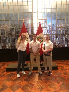 Chadron State College Army ROTC cadets, from left, Kalli Talbot of Rapid City, S.D., Greg McCallum of Chadron, and Kaelyn Kaul of South Dakota School of Mines, pose at the Presidential Palace in Lima, Peru, during a summer 2019 Cadet Coalition Warfighter Program (formerly known as Cultural Understanding and Leadership Program)