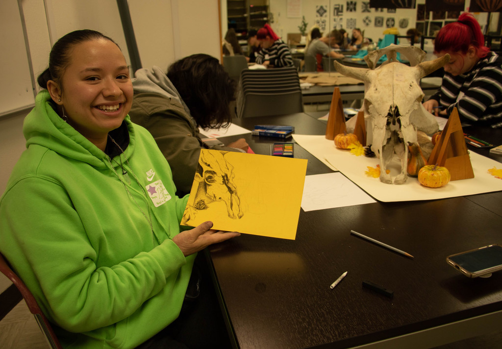 Baylie Her Many Horses of Oelrichs High School (South Dakota) poses during a still life drawing class at Chadron State College's Art Day Nov. 4, 2019, in Memorial Hall.