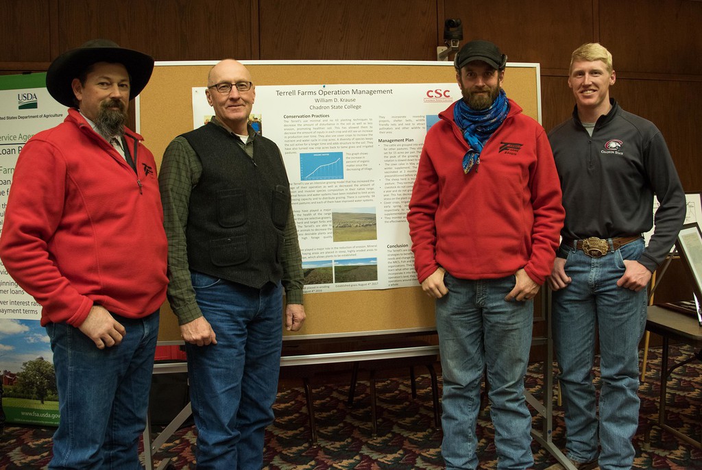 William Krause poses with representatives of Terrell Farms.