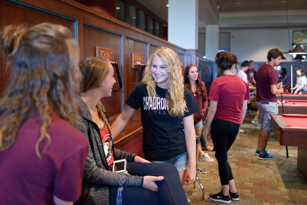 Students gather to mingle in the Pit in CSC's Student Center.