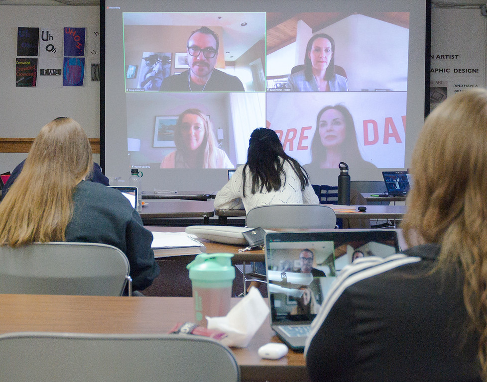 Chadron State College students watch a panel discussion