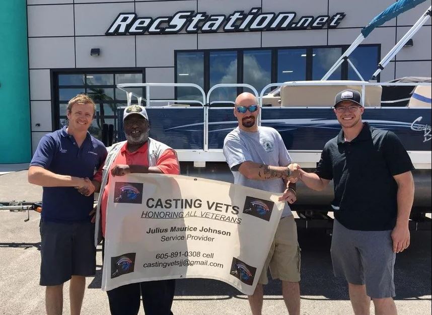 Chadron State College student JR Shaffner, right, works with Casting Vets in Hot Springs