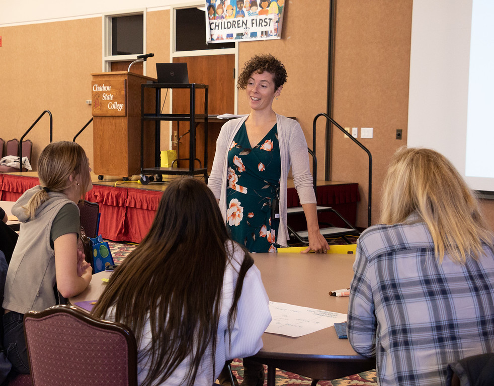 Lauren Stauble presents to students in childhood development.