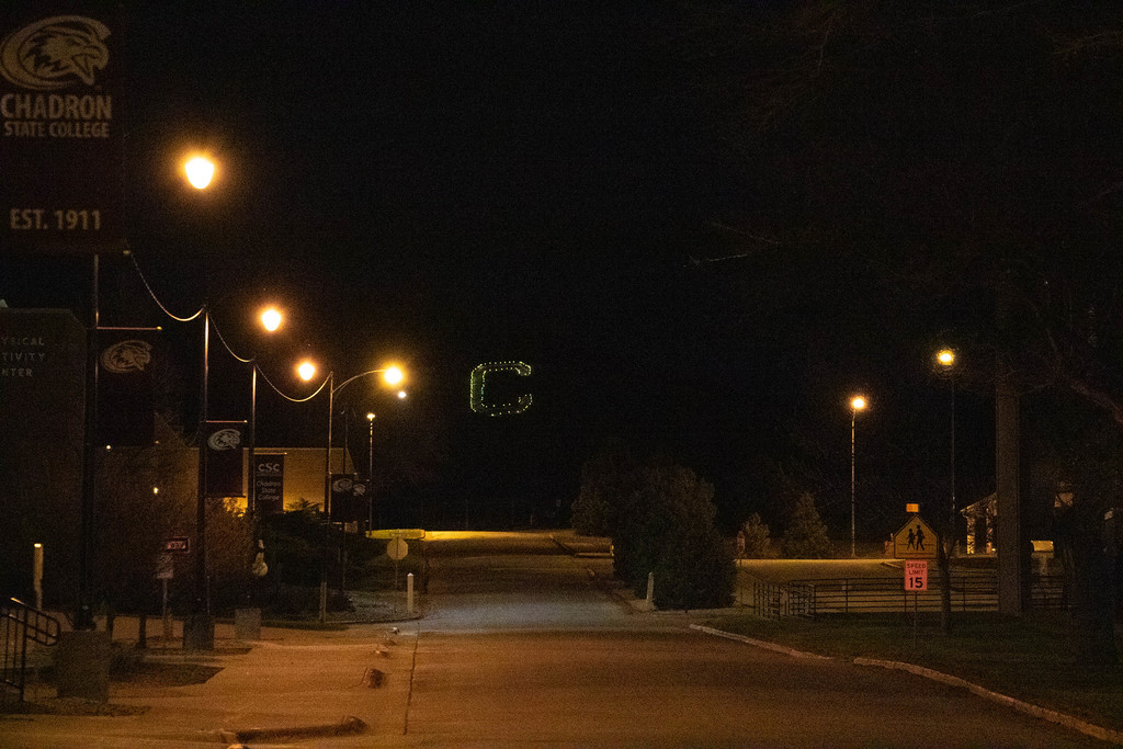 The C on C Hill is outlined and lit up at night for Mental Health Awareness Month