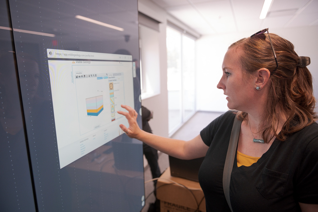 One CSC faculty members displays a graphic on new screens in the new math and science building