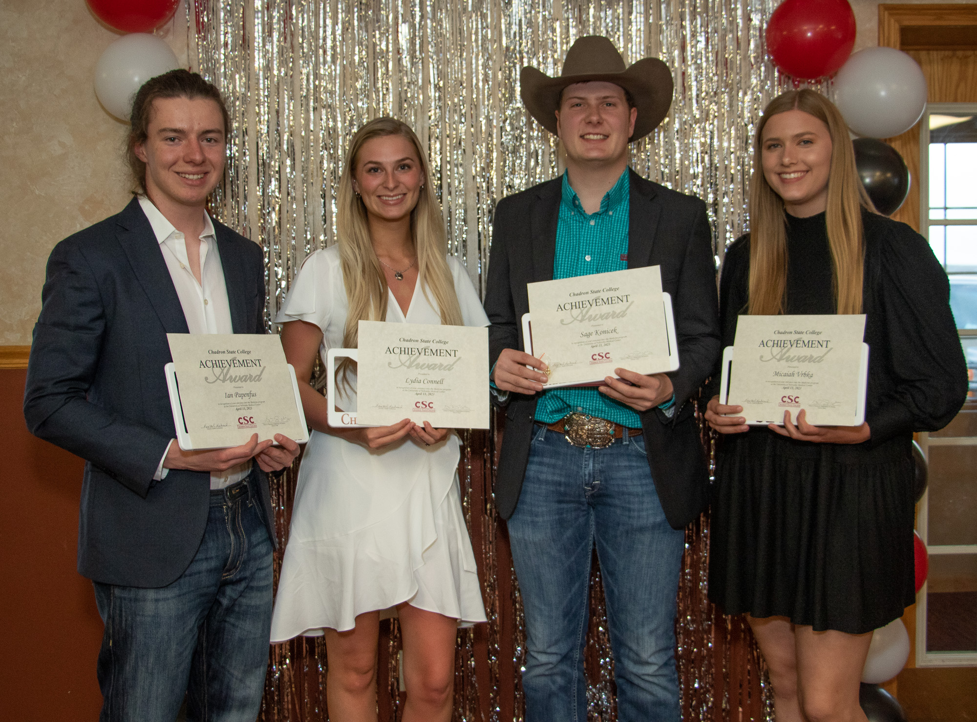 People standing with awards