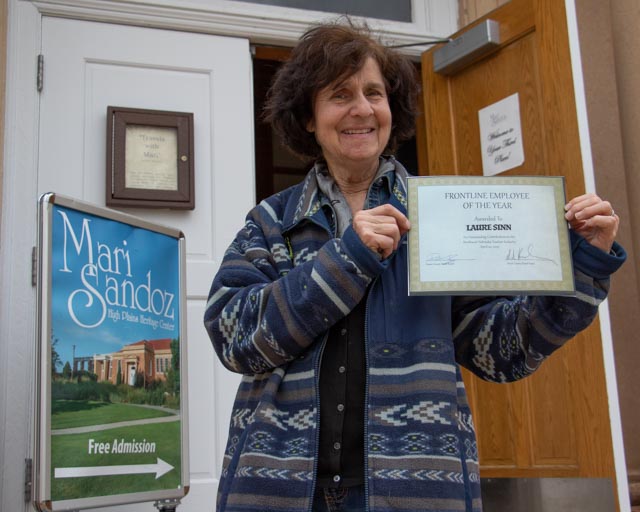 Woman standing with award