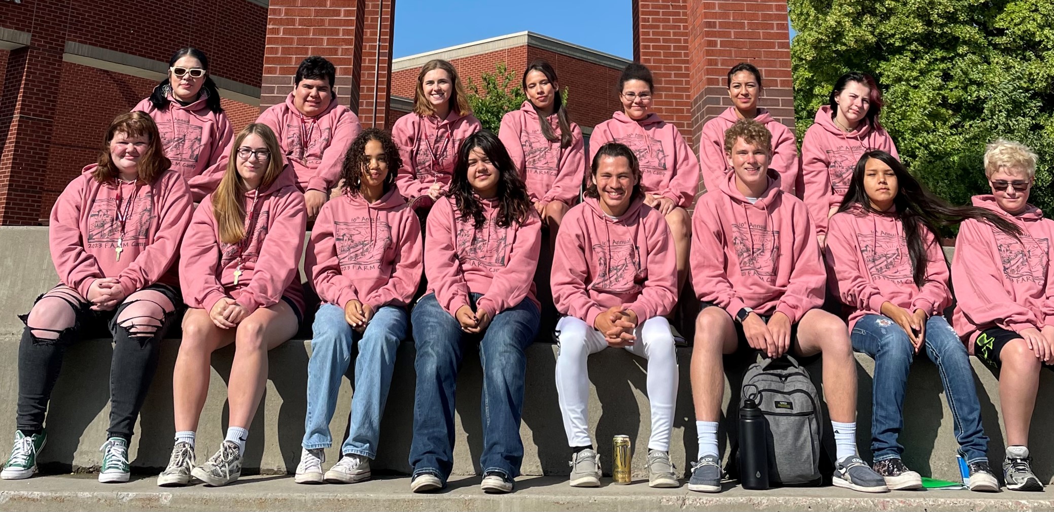 Students pose by clock tower