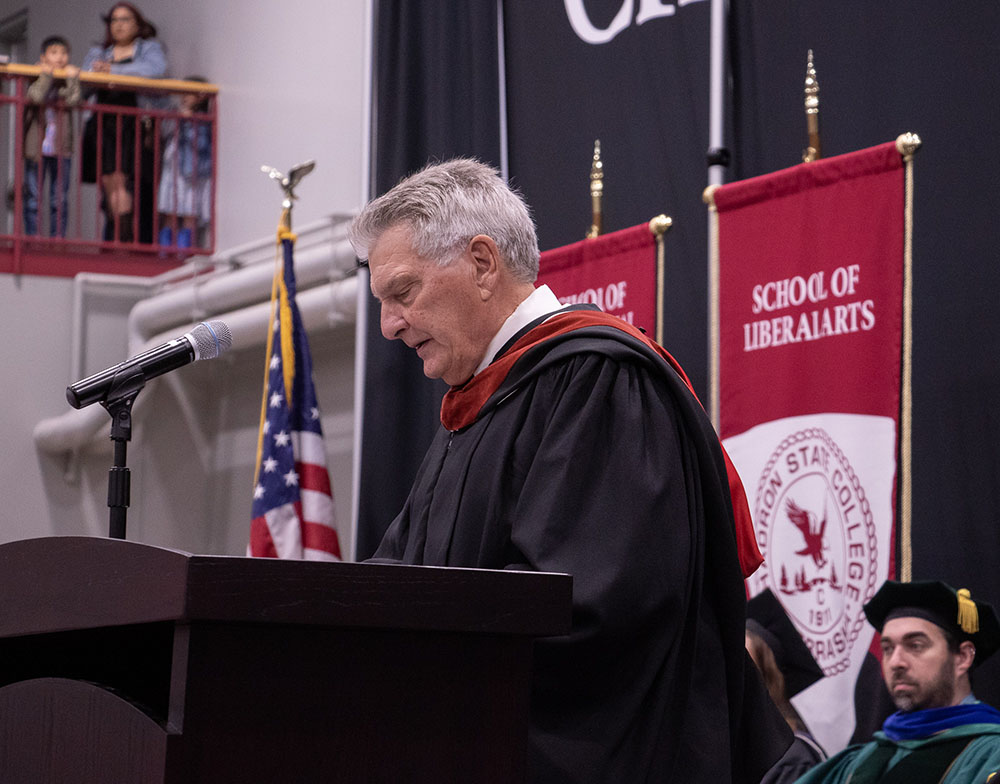 Male speaker at podium