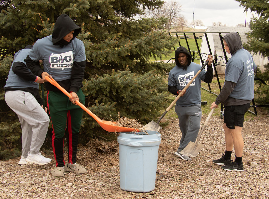 Men doing yard work