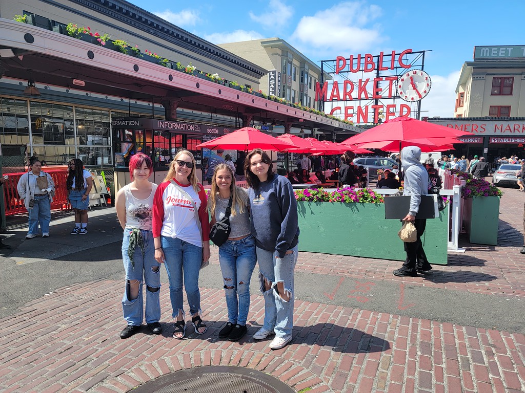 Four women posing outdoors in Seattle