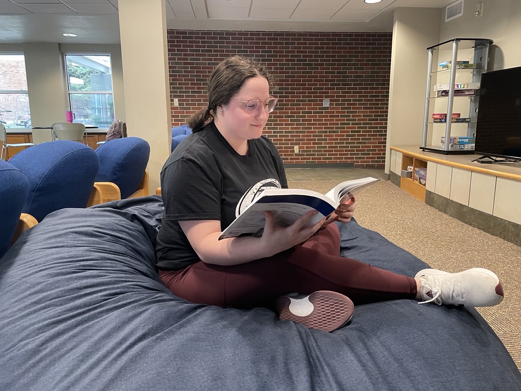 Woman on a bean bag chair