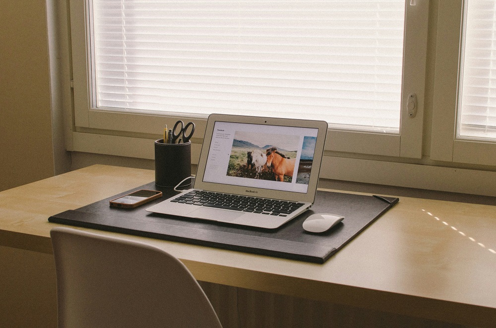 Image showing a small desk with a laptop